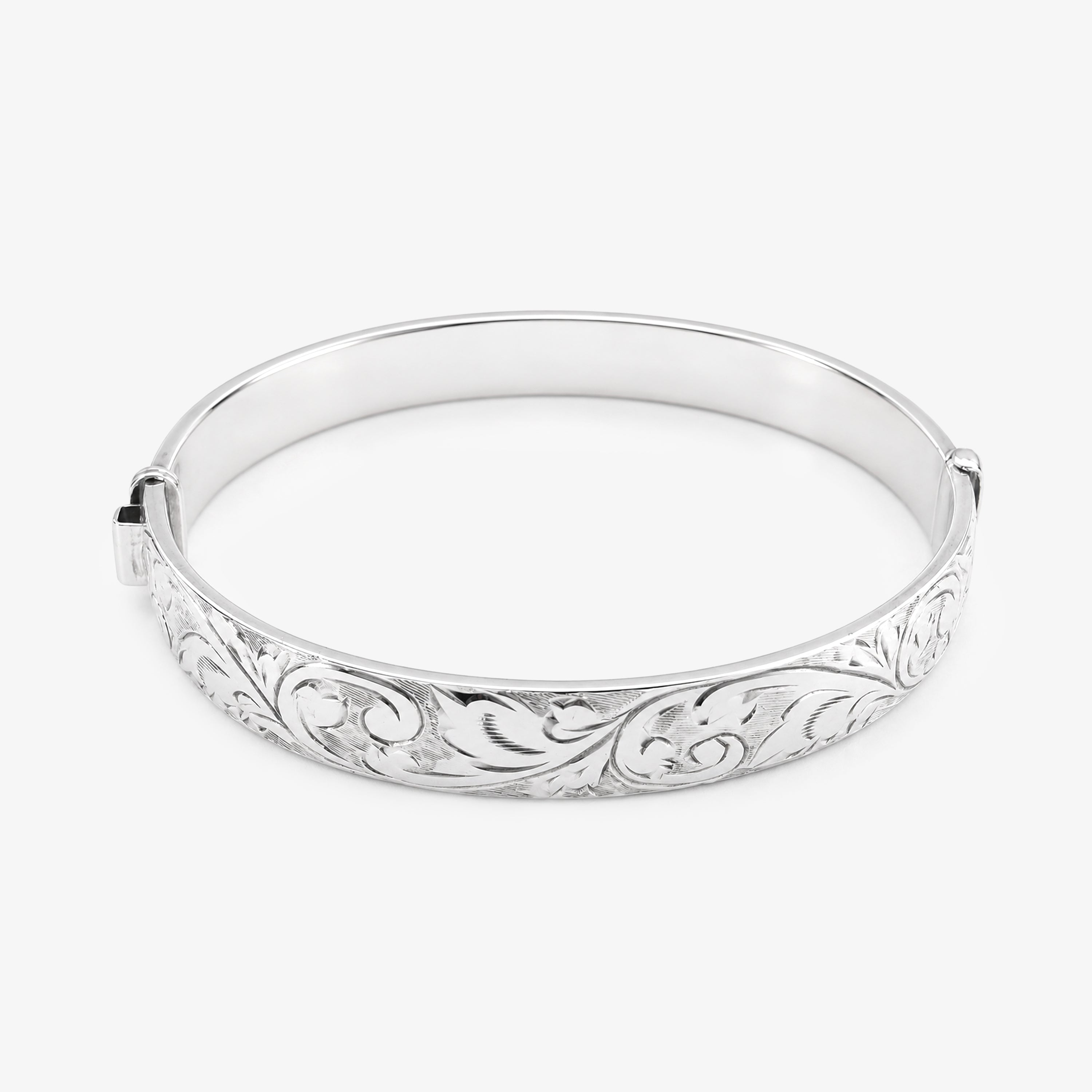 Vintage Silver Hinged Bangle with Swirl Pattern