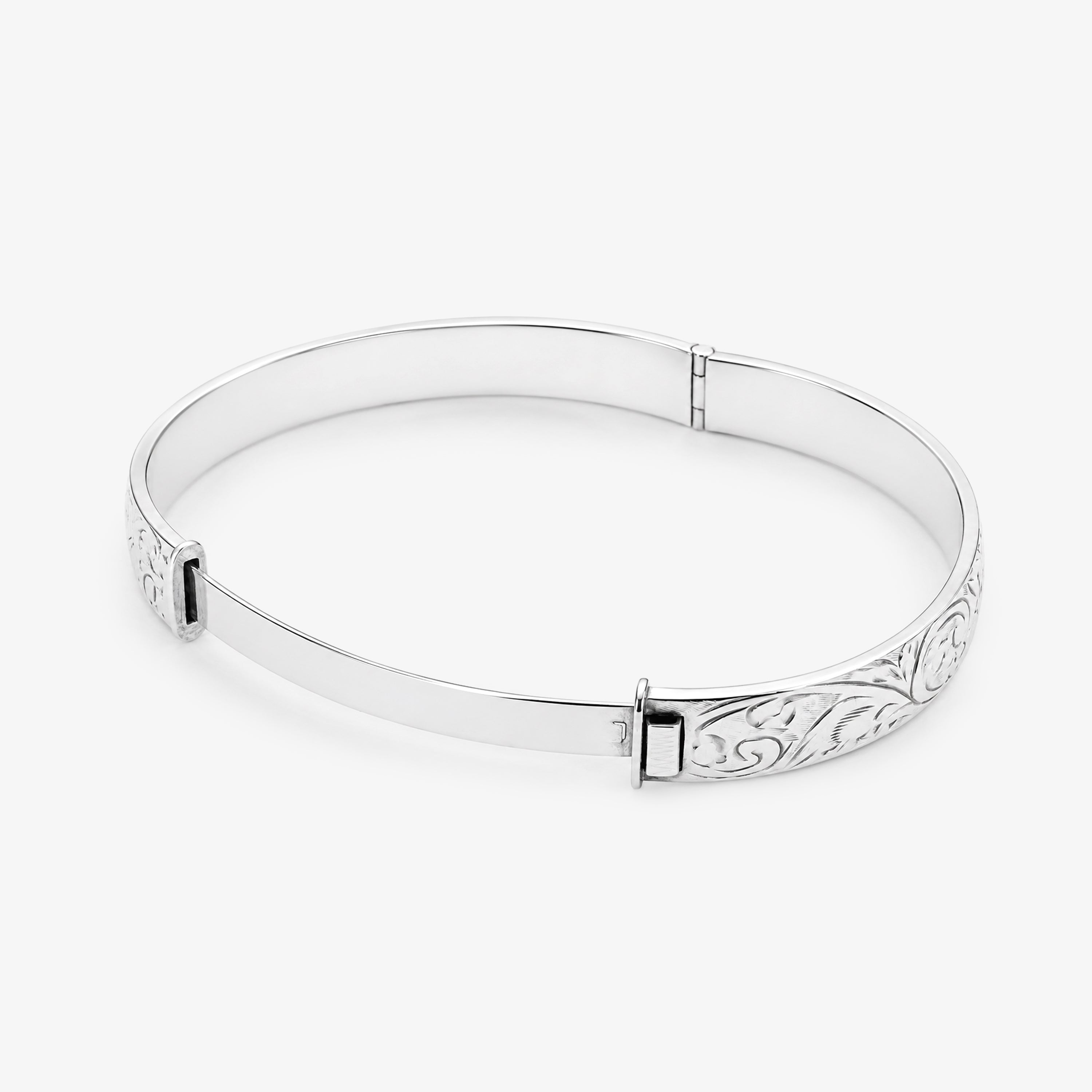 Vintage Silver Hinged Bangle with Swirl Pattern