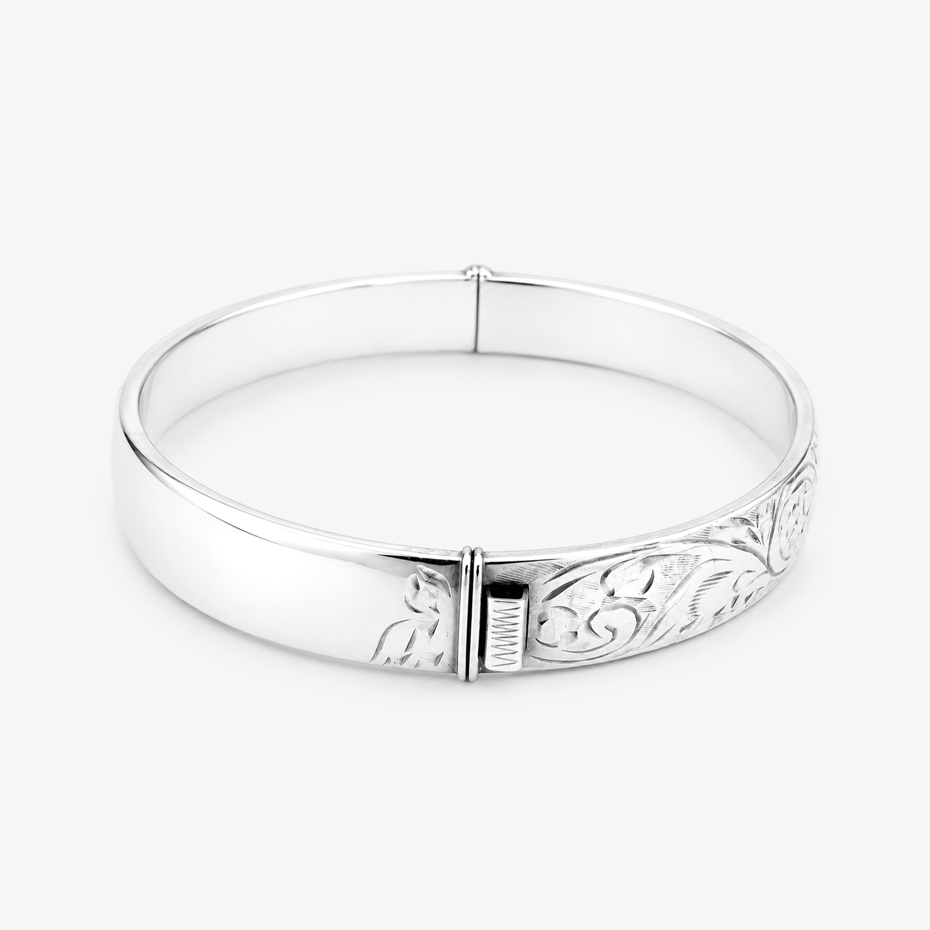 Vintage Silver Hinged Bangle with Swirl Pattern