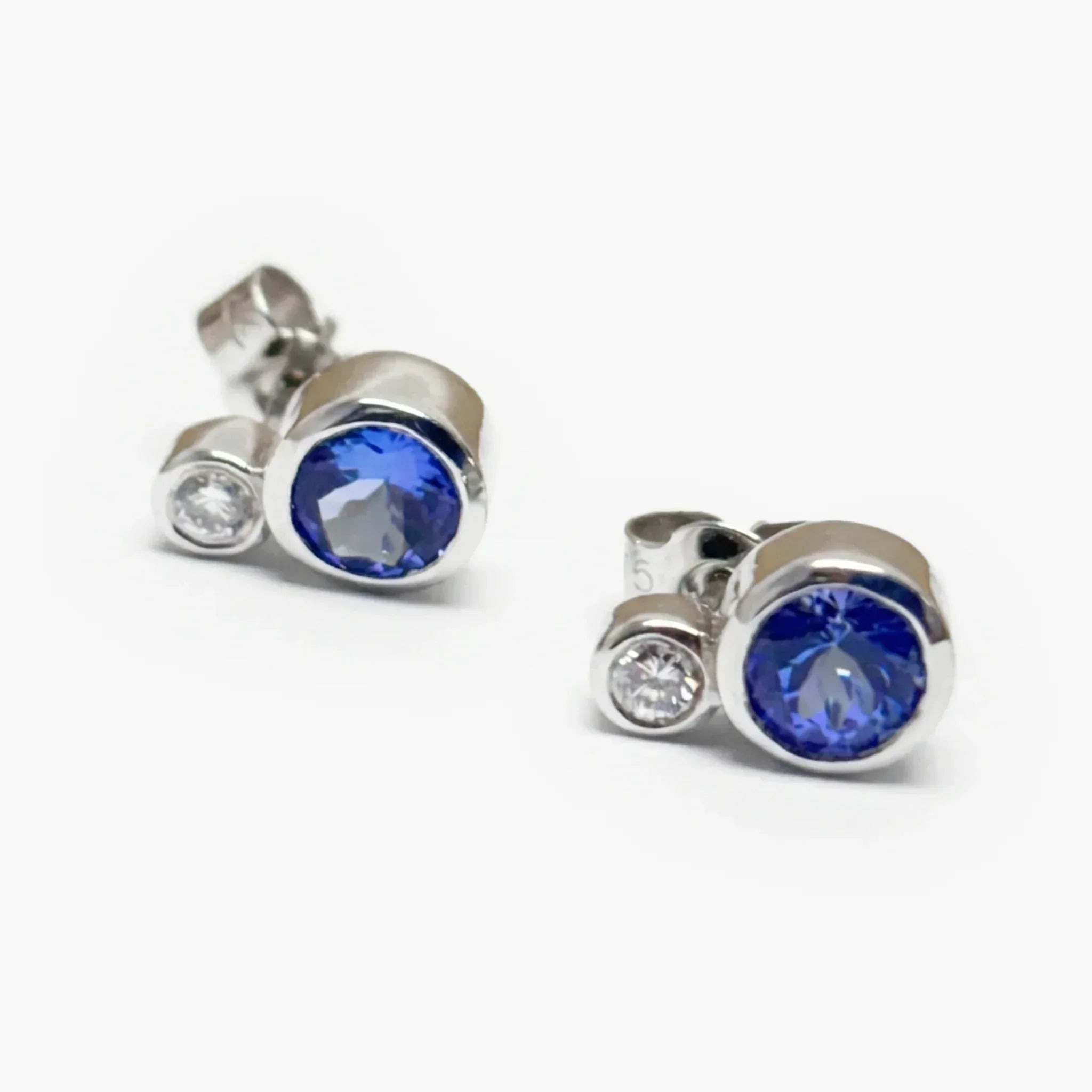 9ct White Gold Tanzanite & Diamond Rubover Stud Earrings - The Jewel House