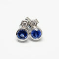 9ct White Gold Tanzanite & Diamond Rubover Stud Earrings - The Jewel House
